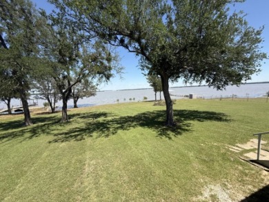 Enjoy Lake Views From This Coveted Waterfront Property on The Club At Runaway Bay in Texas - for sale on GolfHomes.com, golf home, golf lot