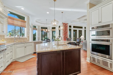 Boasting expansive golf views of the famed North Course at on Berkeley Hall Golf Club in South Carolina - for sale on GolfHomes.com, golf home, golf lot