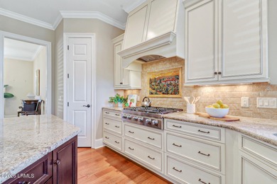 Boasting expansive golf views of the famed North Course at on Berkeley Hall Golf Club in South Carolina - for sale on GolfHomes.com, golf home, golf lot