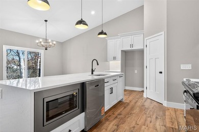 Custom-built new construction ranch nestled in a coveted gated on Incline Village Golf Course in Missouri - for sale on GolfHomes.com, golf home, golf lot