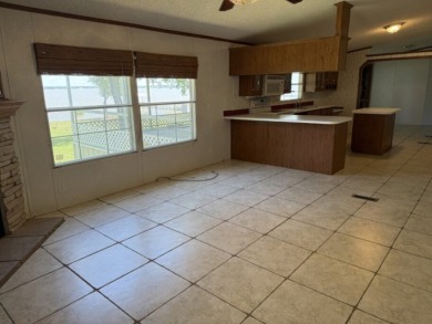 Enjoy Lake Views From This Coveted Waterfront Property on The Club At Runaway Bay in Texas - for sale on GolfHomes.com, golf home, golf lot