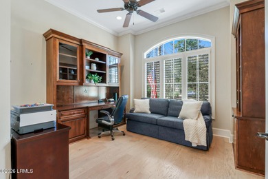 Boasting expansive golf views of the famed North Course at on Berkeley Hall Golf Club in South Carolina - for sale on GolfHomes.com, golf home, golf lot