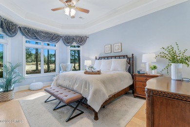 Boasting expansive golf views of the famed North Course at on Berkeley Hall Golf Club in South Carolina - for sale on GolfHomes.com, golf home, golf lot