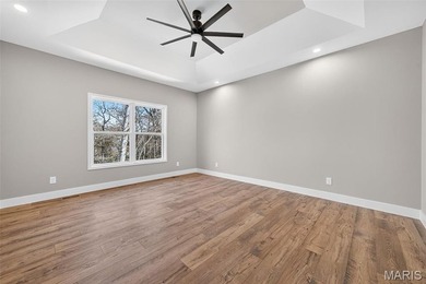 Custom-built new construction ranch nestled in a coveted gated on Incline Village Golf Course in Missouri - for sale on GolfHomes.com, golf home, golf lot