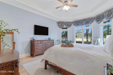 Boasting expansive golf views of the famed North Course at on Berkeley Hall Golf Club in South Carolina - for sale on GolfHomes.com, golf home, golf lot