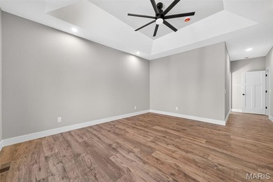 Custom-built new construction ranch nestled in a coveted gated on Incline Village Golf Course in Missouri - for sale on GolfHomes.com, golf home, golf lot