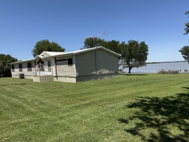 Enjoy Lake Views From This Coveted Waterfront Property on The Club At Runaway Bay in Texas - for sale on GolfHomes.com, golf home, golf lot
