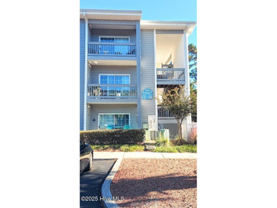 Welcome to this Coastal Retreat sitting within the prestigious on Sea Trail Golf Resort in North Carolina - for sale on GolfHomes.com, golf home, golf lot