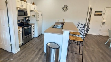 Welcome to this Coastal Retreat sitting within the prestigious on Sea Trail Golf Resort in North Carolina - for sale on GolfHomes.com, golf home, golf lot