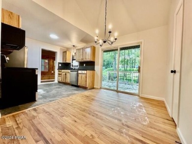 Discover this fully renovated home in the heart of the Hemlock on Lords Valley Country Club, Inc in Pennsylvania - for sale on GolfHomes.com, golf home, golf lot