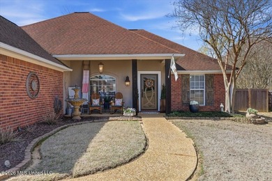 Welcome home to 522 Patrick Farms Drive! If you are looking for on Patrick Farms Golf Club in Mississippi - for sale on GolfHomes.com, golf home, golf lot