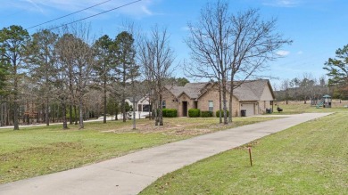 Discover the perfect blend of comfort and style in this on Russellville Country Club in Arkansas - for sale on GolfHomes.com, golf home, golf lot