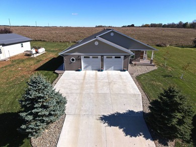 Built in 2021, this three-bedroom, two-bathroom back-lot lake on Roy View Golf Course in South Dakota - for sale on GolfHomes.com, golf home, golf lot
