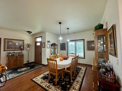 Built in 2021, this three-bedroom, two-bathroom back-lot lake on Roy View Golf Course in South Dakota - for sale on GolfHomes.com, golf home, golf lot