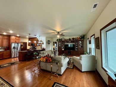 Built in 2021, this three-bedroom, two-bathroom back-lot lake on Roy View Golf Course in South Dakota - for sale on GolfHomes.com, golf home, golf lot