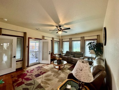 Built in 2021, this three-bedroom, two-bathroom back-lot lake on Roy View Golf Course in South Dakota - for sale on GolfHomes.com, golf home, golf lot