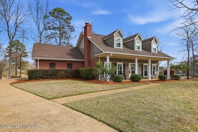 Welcome to this meticulously maintained three-bedroom, two and a on Castlewoods Golf Club in Mississippi - for sale on GolfHomes.com, golf home, golf lot