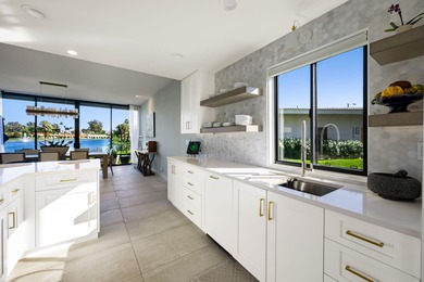 Luxurious lake front condo, nestled in the prestigious Lago La on La Quinta Golf  Resort and Country Clubs in California - for sale on GolfHomes.com, golf home, golf lot