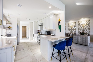 Luxurious lake front condo, nestled in the prestigious Lago La on La Quinta Golf  Resort and Country Clubs in California - for sale on GolfHomes.com, golf home, golf lot