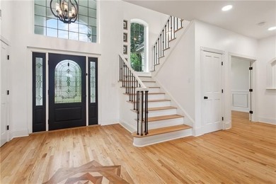 Downstairs primary and guest bathroooms renovated December 2025 on Money Hill Golf and Country Club in Louisiana - for sale on GolfHomes.com, golf home, golf lot