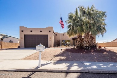 Welcome to this spacious Santa Fe Style 3-bedroom home in Lake on London Bridge Golf Course in Arizona - for sale on GolfHomes.com, golf home, golf lot