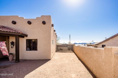 Welcome to this spacious Santa Fe Style 3-bedroom home in Lake on London Bridge Golf Course in Arizona - for sale on GolfHomes.com, golf home, golf lot