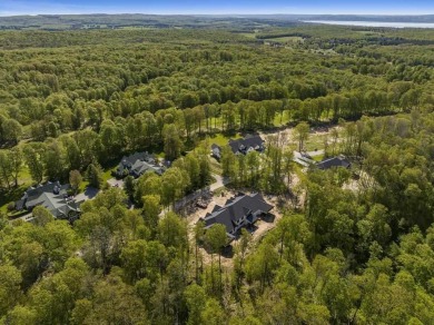 Discover luxury living at 807 Fairways Drive. Located in the on Birchwood Farms Golf and Country Club in Michigan - for sale on GolfHomes.com, golf home, golf lot