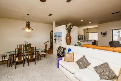 Welcome to this spacious Santa Fe Style 3-bedroom home in Lake on London Bridge Golf Course in Arizona - for sale on GolfHomes.com, golf home, golf lot
