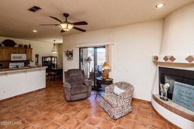 Welcome to this spacious Santa Fe Style 3-bedroom home in Lake on London Bridge Golf Course in Arizona - for sale on GolfHomes.com, golf home, golf lot