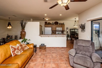Welcome to this spacious Santa Fe Style 3-bedroom home in Lake on London Bridge Golf Course in Arizona - for sale on GolfHomes.com, golf home, golf lot