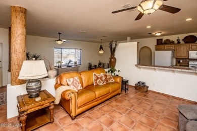 Welcome to this spacious Santa Fe Style 3-bedroom home in Lake on London Bridge Golf Course in Arizona - for sale on GolfHomes.com, golf home, golf lot