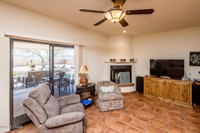 Welcome to this spacious Santa Fe Style 3-bedroom home in Lake on London Bridge Golf Course in Arizona - for sale on GolfHomes.com, golf home, golf lot
