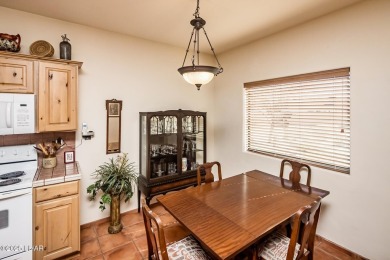 Welcome to this spacious Santa Fe Style 3-bedroom home in Lake on London Bridge Golf Course in Arizona - for sale on GolfHomes.com, golf home, golf lot