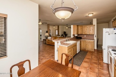 Welcome to this spacious Santa Fe Style 3-bedroom home in Lake on London Bridge Golf Course in Arizona - for sale on GolfHomes.com, golf home, golf lot