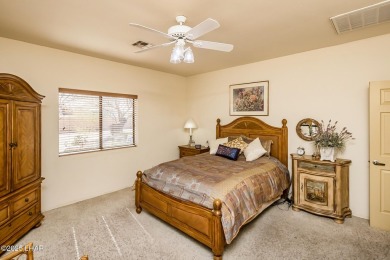 Welcome to this spacious Santa Fe Style 3-bedroom home in Lake on London Bridge Golf Course in Arizona - for sale on GolfHomes.com, golf home, golf lot