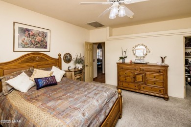 Welcome to this spacious Santa Fe Style 3-bedroom home in Lake on London Bridge Golf Course in Arizona - for sale on GolfHomes.com, golf home, golf lot