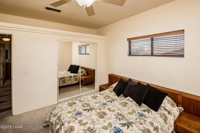 Welcome to this spacious Santa Fe Style 3-bedroom home in Lake on London Bridge Golf Course in Arizona - for sale on GolfHomes.com, golf home, golf lot