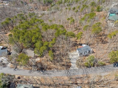 Perched among some of the highest elevations in Lake Arrowhead on The Highlands Course at Lake Arrowhead in Georgia - for sale on GolfHomes.com, golf home, golf lot