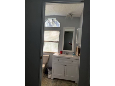 This home is in a 55 plus community with a monthly lot rent of on Crystal Lake Club in Florida - for sale on GolfHomes.com, golf home, golf lot