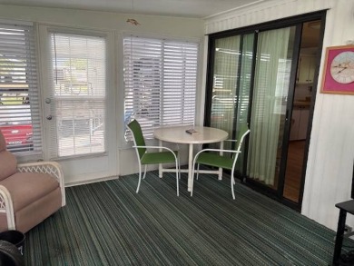 This home is in a 55 plus community with a monthly lot rent of on Crystal Lake Club in Florida - for sale on GolfHomes.com, golf home, golf lot