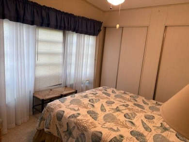 This home is in a 55 plus community with a monthly lot rent of on Crystal Lake Club in Florida - for sale on GolfHomes.com, golf home, golf lot