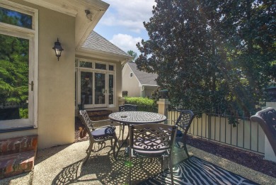 This elegant home with stunning finishes is nestled privately on on Woodside Plantation Country Club in South Carolina - for sale on GolfHomes.com, golf home, golf lot