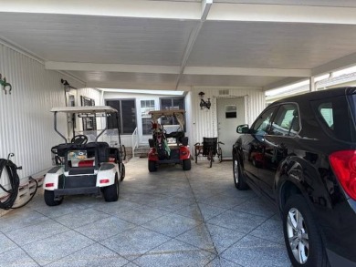 This home is in a 55 plus community with a monthly lot rent of on Crystal Lake Club in Florida - for sale on GolfHomes.com, golf home, golf lot