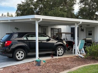 This home is in a 55 plus community with a monthly lot rent of on Crystal Lake Club in Florida - for sale on GolfHomes.com, golf home, golf lot