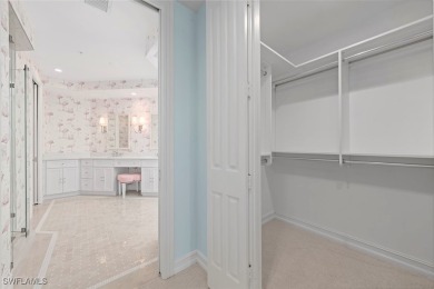 This stunning penthouse offers sweeping views down the 9th on The Sanctuary Golf Club in Florida - for sale on GolfHomes.com, golf home, golf lot