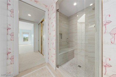 This stunning penthouse offers sweeping views down the 9th on The Sanctuary Golf Club in Florida - for sale on GolfHomes.com, golf home, golf lot