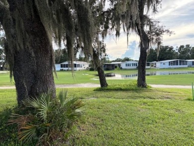 This home is in a 55 plus community with a monthly lot rent of on Crystal Lake Club in Florida - for sale on GolfHomes.com, golf home, golf lot