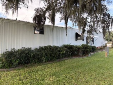 This home is in a 55 plus community with a monthly lot rent of on Crystal Lake Club in Florida - for sale on GolfHomes.com, golf home, golf lot