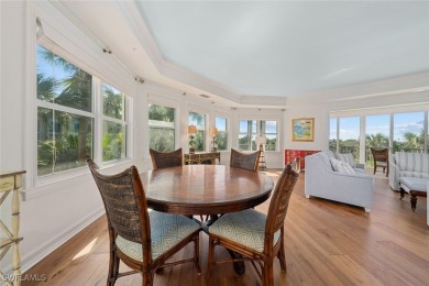 This stunning penthouse offers sweeping views down the 9th on The Sanctuary Golf Club in Florida - for sale on GolfHomes.com, golf home, golf lot