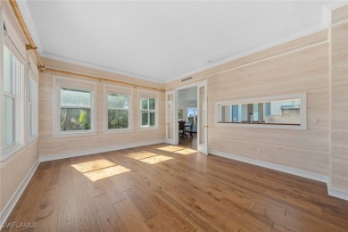 This stunning penthouse offers sweeping views down the 9th on The Sanctuary Golf Club in Florida - for sale on GolfHomes.com, golf home, golf lot